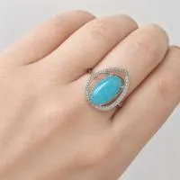 Кольцо из серебра с натуральным аквамарином и фианитами