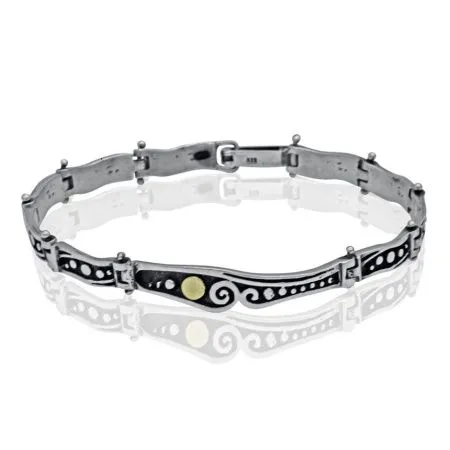 Этнический серебряный браслет с золотыми вставками