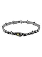 Этнический серебряный браслет с золотыми вставками