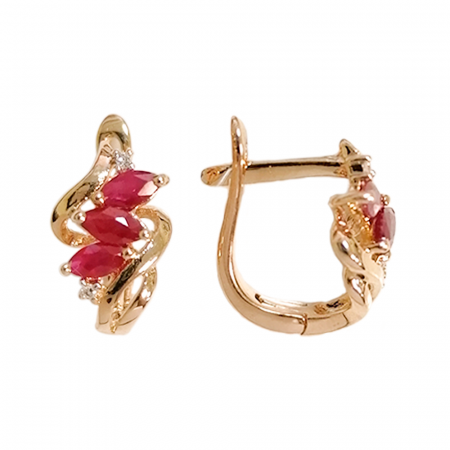 Серьги из красного золота с рубинами и бриллиантами.